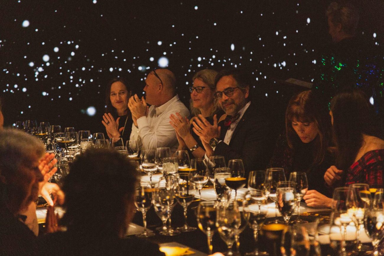 A beautifully set table at an event dinner showcasing streamlined dinner planning for large events in Missouri.